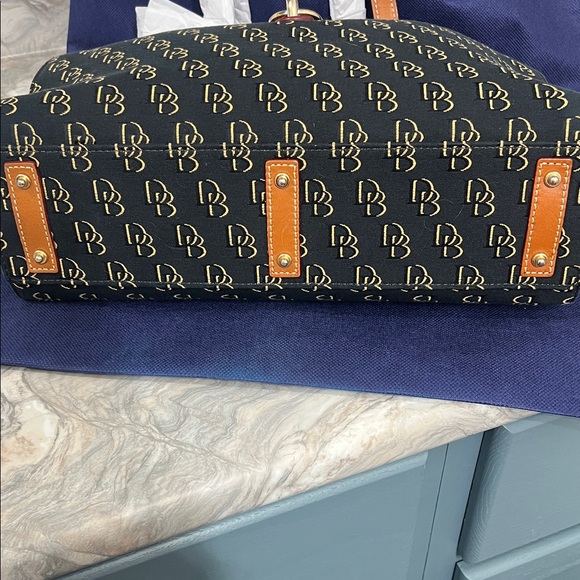 Dooney & Bourke Black Signature Tote with Tan Leather Trim and Gold Hardware - Picture 3 of 13